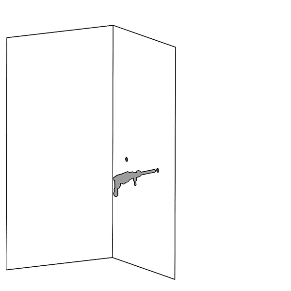 El taladro percusivo se utiliza para perforar dos agujeros en la pared.
